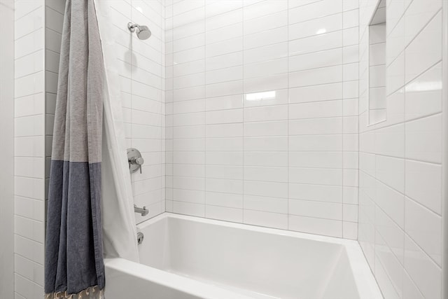 bathroom featuring shower / tub combo