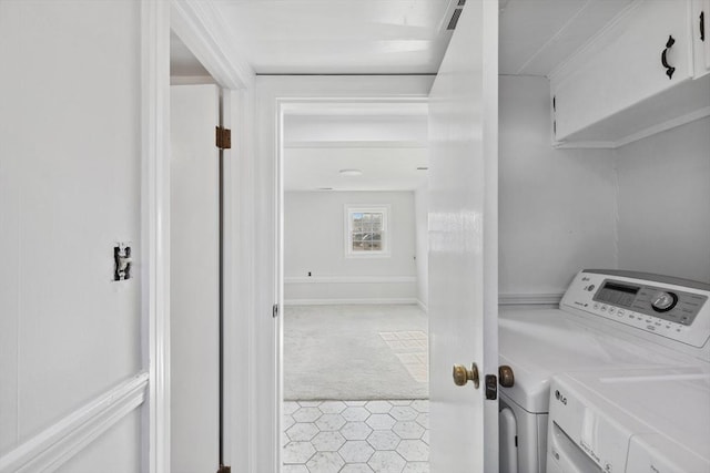 laundry area with laundry area, separate washer and dryer, and carpet floors