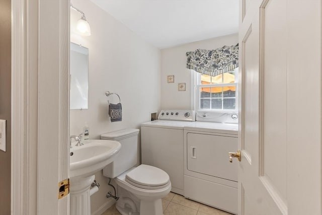 2 Pomfret Rd, Chelmsford, MA 01824 - bathroom featuring washing machine and dryer, toilet, and tile patterned floors
