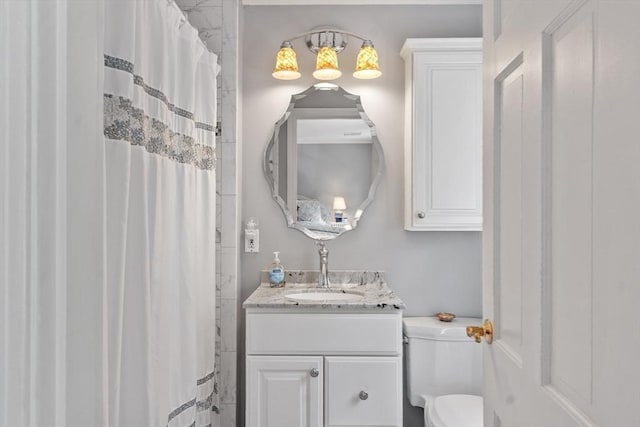 2 Pomfret Rd, Chelmsford, MA 01824 - full bath with toilet, vanity, and a shower with shower curtain