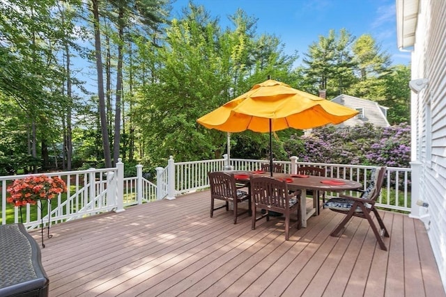 2 Pomfret Rd, Chelmsford, MA 01824 - deck with outdoor dining area and view of wooded area