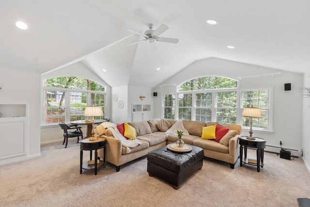 2 Pomfret Rd, Chelmsford, MA 01824 - living room with plenty of natural light, light colored carpet, a baseboard radiator, vaulted ceiling, and ceiling fan
