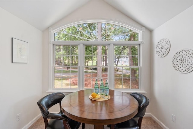 2 Pomfret Rd, Chelmsford, MA 01824 - carpeted dining area with vaulted ceiling, baseboards, and healthy amount of natural light