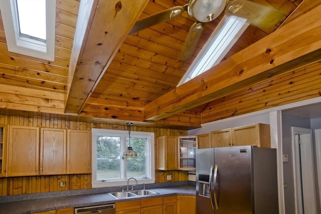 kitchen with appliances with stainless steel finishes, pendant lighting, sink, light brown cabinets, and wooden ceiling