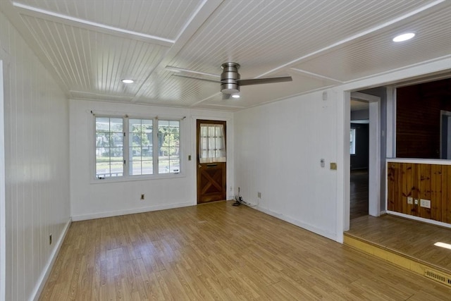 unfurnished room featuring ceiling fan, wood ceiling, and light wood-type flooring