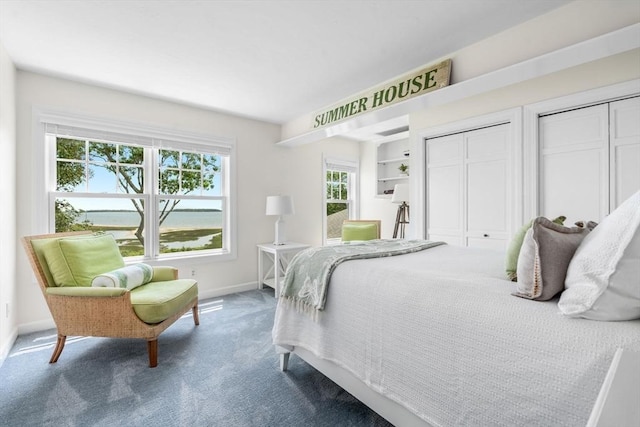 21 Glenwood St, Yarmouth, MA 02673 - carpeted bedroom with baseboards and two closets
