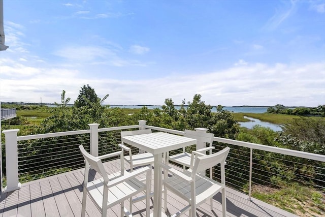 21 Glenwood St, Yarmouth, MA 02673 - wooden deck with a water view and outdoor dining area