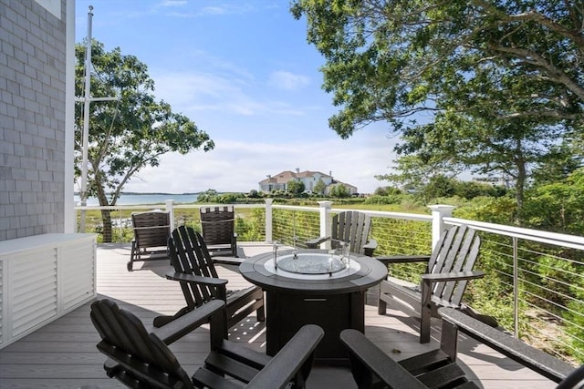 21 Glenwood St, Yarmouth, MA 02673 - wooden terrace featuring an outdoor fire pit and a water view