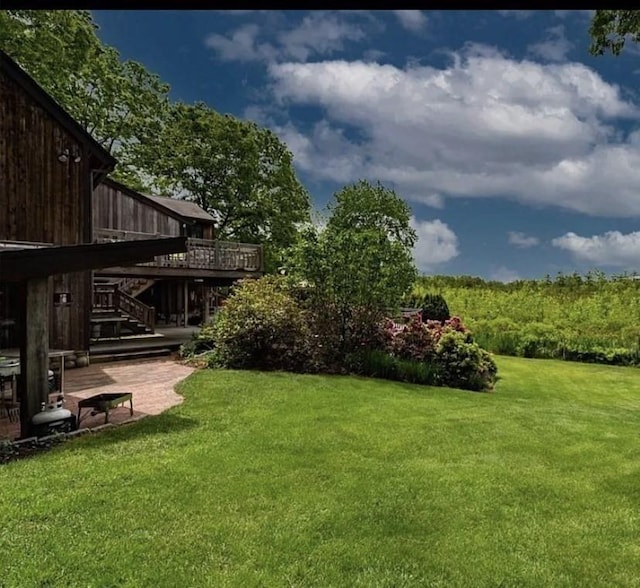 1820 Bay St, Taunton, MA 02780 - view of green lawn featuring stairway and a wooden deck