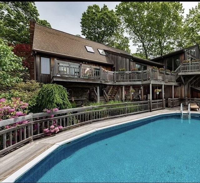 1820 Bay St, Taunton, MA 02780 - swimming pool with a wooden deck and stairs