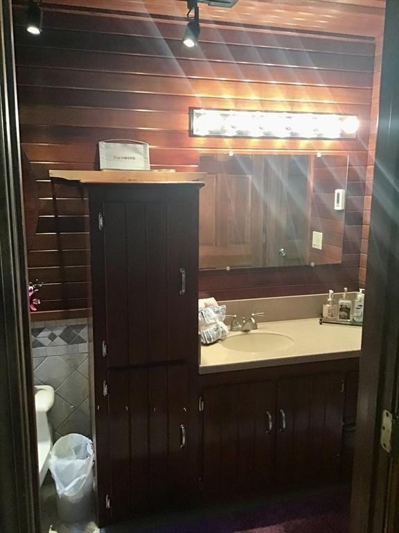 1820 Bay St, Taunton, MA 02780 - half bath featuring vanity, toilet, and tile walls