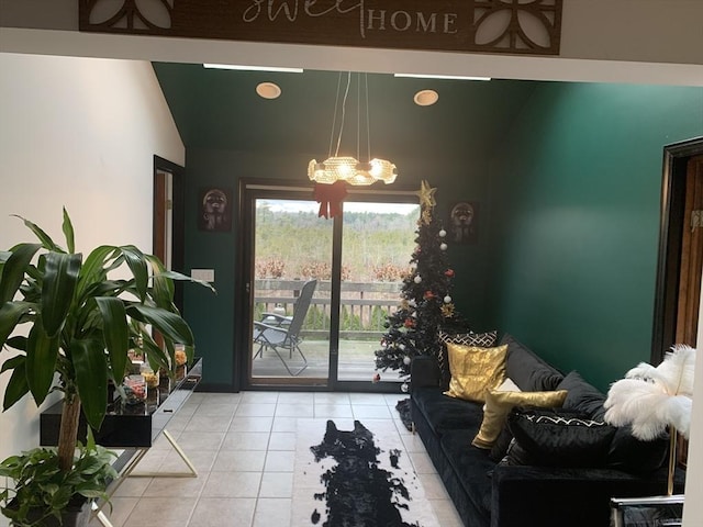 1820 Bay St, Taunton, MA 02780 - living area featuring light tile patterned floors, a chandelier, and vaulted ceiling