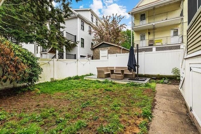 29 Daniels St Unit 29, Arlington, MA 02476 - fenced backyard with outdoor lounge area