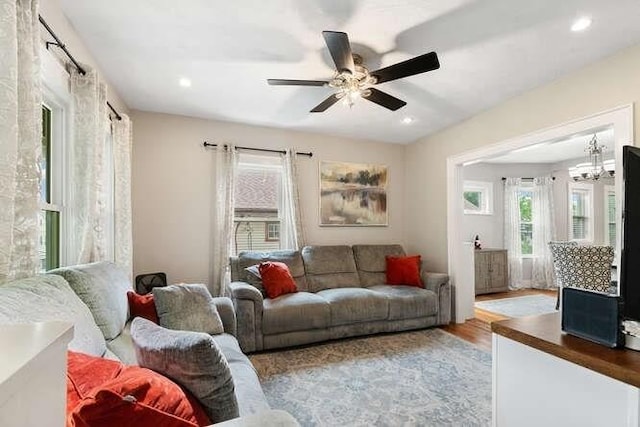 29 Daniels St Unit 29, Arlington, MA 02476 - living area featuring wood finished floors, ceiling fan, and recessed lighting
