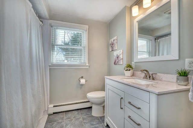 bathroom with toilet, a shower with shower curtain, baseboard heating, tile patterned floors, and vanity