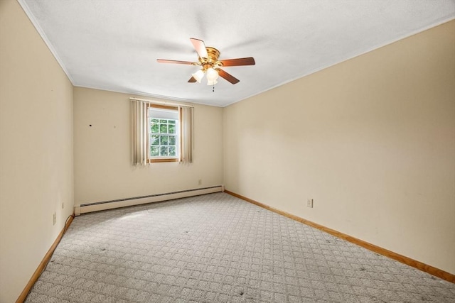 carpeted empty room with a baseboard heating unit, ceiling fan, baseboards, and ornamental molding