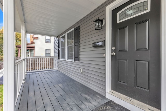 wooden deck featuring covered porch