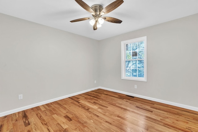 unfurnished room with light hardwood / wood-style floors and ceiling fan