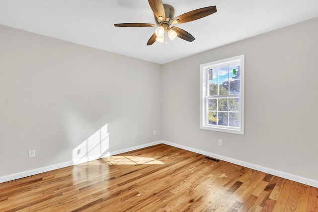 unfurnished room with light hardwood / wood-style flooring and ceiling fan