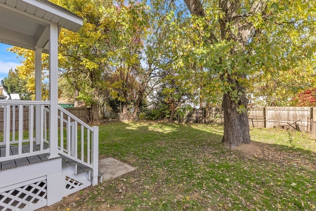 view of yard with a wooden deck