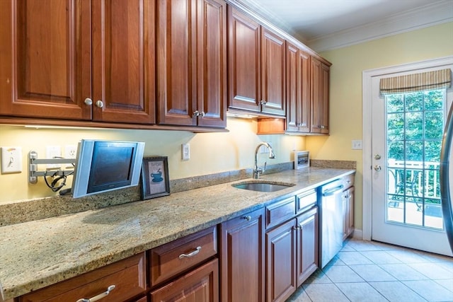 kitchen with a wealth of natural light, dishwasher, a sink, and ornamental molding