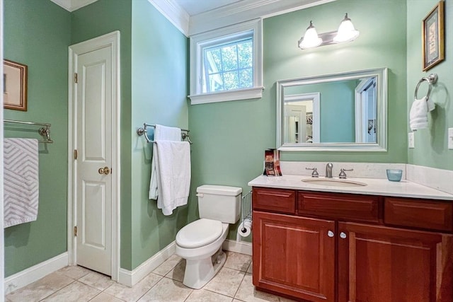 bathroom with toilet, ornamental molding, tile patterned floors, and vanity