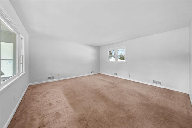 301 Main St, Acushnet, MA 02743 - carpeted empty room featuring baseboards