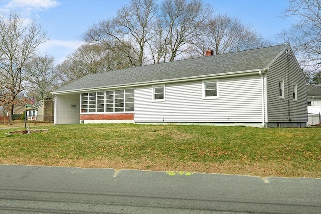 301 Main St, Acushnet, MA 02743 - view of side of home featuring a chimney, a yard, and a shingled roof