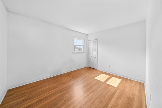 301 Main St, Acushnet, MA 02743 - spare room with light wood-style flooring and baseboards