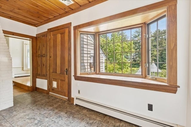 16 River Rd, Hanover, MA 02339 - tiled empty room with baseboard heating, wood ceiling, a baseboard heating unit, and decorative columns