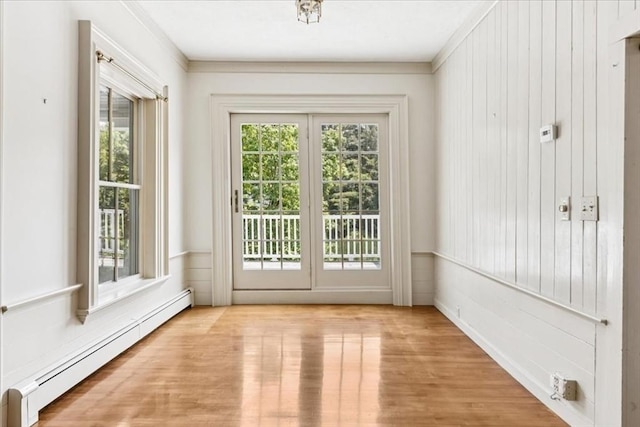 16 River Rd, Hanover, MA 02339 - doorway with a baseboard heating unit, wood finished floors, and ornamental molding