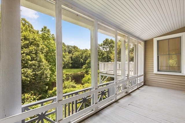 16 River Rd, Hanover, MA 02339 - unfurnished sunroom featuring vaulted ceiling, healthy amount of natural light, and view of wooded area