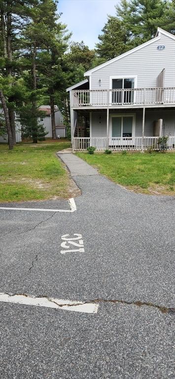 70 Cape Dr Unit 12C, Mashpee, MA 02649 - view of front of house with a front yard