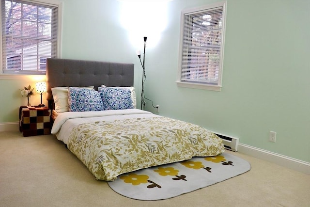 70 Cape Dr Unit 12C, Mashpee, MA 02649 - carpeted bedroom with baseboards and a baseboard radiator