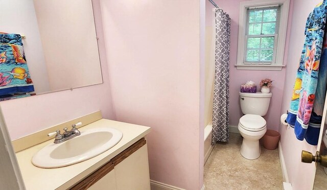70 Cape Dr Unit 12C, Mashpee, MA 02649 - bathroom featuring baseboards, toilet, and vanity