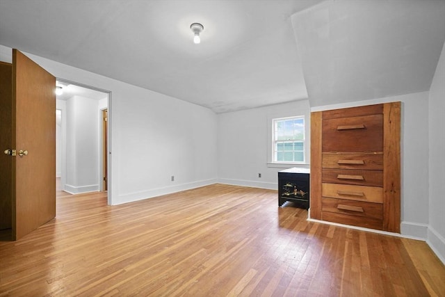 58 Huntington Ave, Dartmouth, MA 02747 - unfurnished room featuring light wood finished floors, baseboards, and vaulted ceiling