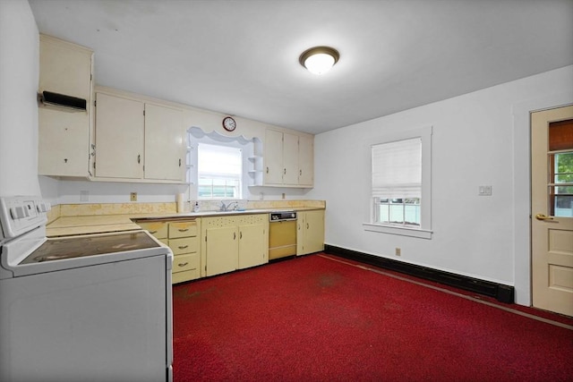 58 Huntington Ave, Dartmouth, MA 02747 - kitchen with dishwasher, washer / clothes dryer, light countertops, cream cabinetry, and white range with electric cooktop