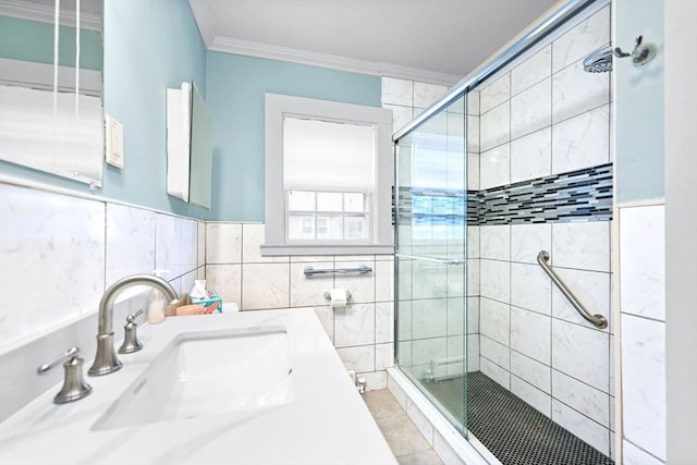 58 Huntington Ave, Dartmouth, MA 02747 - full bathroom with crown molding, a stall shower, tile patterned flooring, tile walls, and vanity