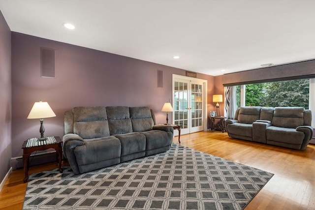 5 Cutler Rd, Paxton, MA 01612 - living area with wood finished floors, a baseboard heating unit, french doors, and recessed lighting