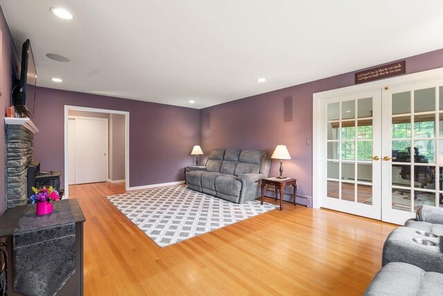 5 Cutler Rd, Paxton, MA 01612 - living room with a baseboard radiator, wood finished floors, french doors, recessed lighting, and a baseboard heating unit