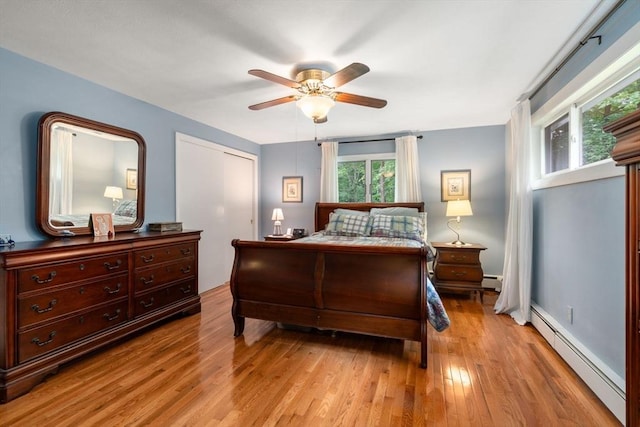 5 Cutler Rd, Paxton, MA 01612 - bedroom featuring baseboard heating, light wood-style flooring, and a ceiling fan