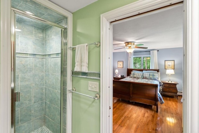 5 Cutler Rd, Paxton, MA 01612 - full bathroom featuring a ceiling fan, a stall shower, wood finished floors, and ensuite bathroom