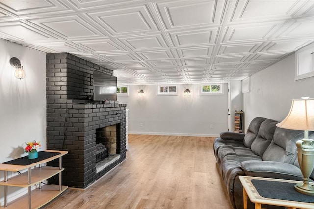 5 Cutler Rd, Paxton, MA 01612 - living area with an ornate ceiling, a brick fireplace, and light wood-type flooring