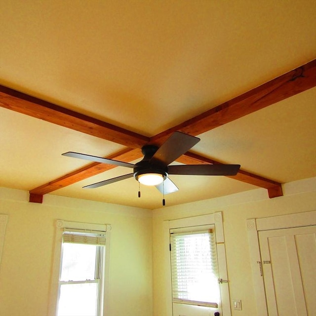 room details with beamed ceiling and ceiling fan