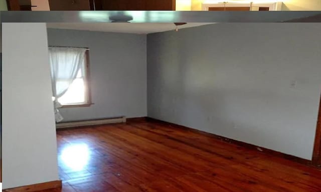 empty room featuring dark hardwood / wood-style flooring and baseboard heating