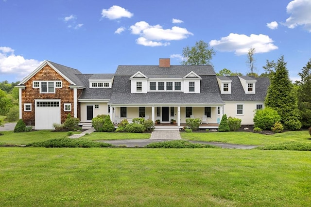 81 Hanover Rd, Carlisle, MA 01741 - shingle-style home featuring covered porch, a chimney, a front yard, and roof with shingles