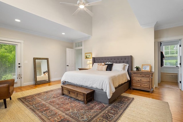 81 Hanover Rd, Carlisle, MA 01741 - bedroom with crown molding, light wood-type flooring, access to exterior, baseboards, and recessed lighting