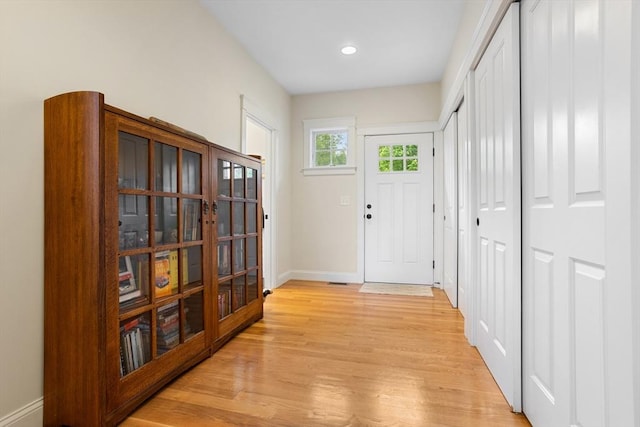 81 Hanover Rd, Carlisle, MA 01741 - entrance foyer with baseboards, light wood-type flooring, french doors, and recessed lighting