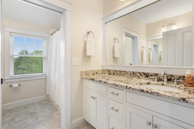 81 Hanover Rd, Carlisle, MA 01741 - bathroom featuring vanity and baseboards
