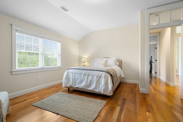 81 Hanover Rd, Carlisle, MA 01741 - bedroom featuring vaulted ceiling, baseboards, and wood finished floors